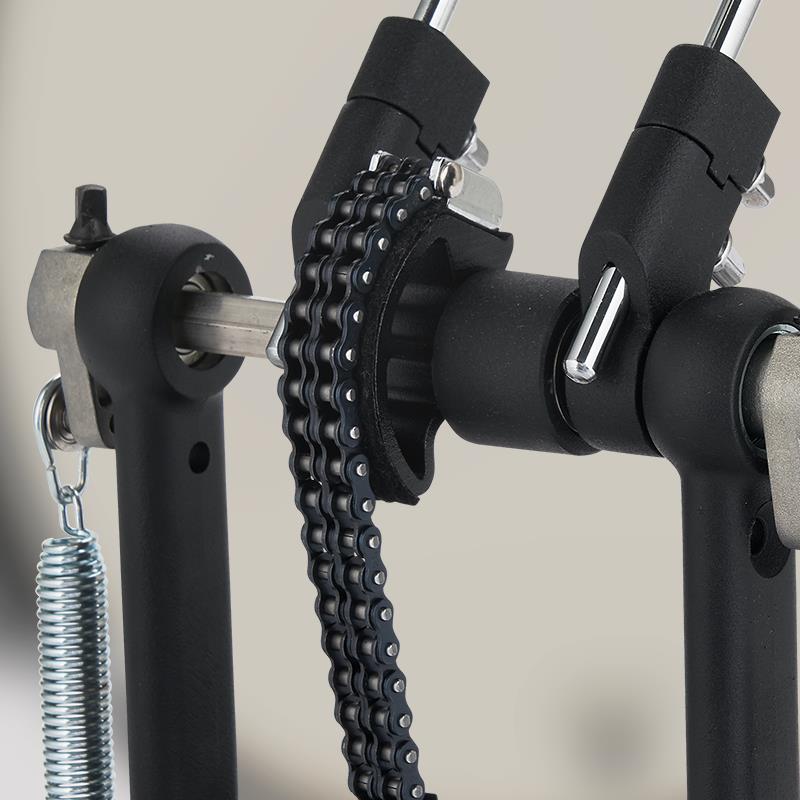 PDP 800 Series double drum pedal with chrome finish, featuring dual footboards and adjustable tension for bass drum playing.