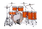 Mapex Mars Maple 6-piece drum kit with glossy amber finish, featuring StudioEase shells and SonicClear tom suspension system.
