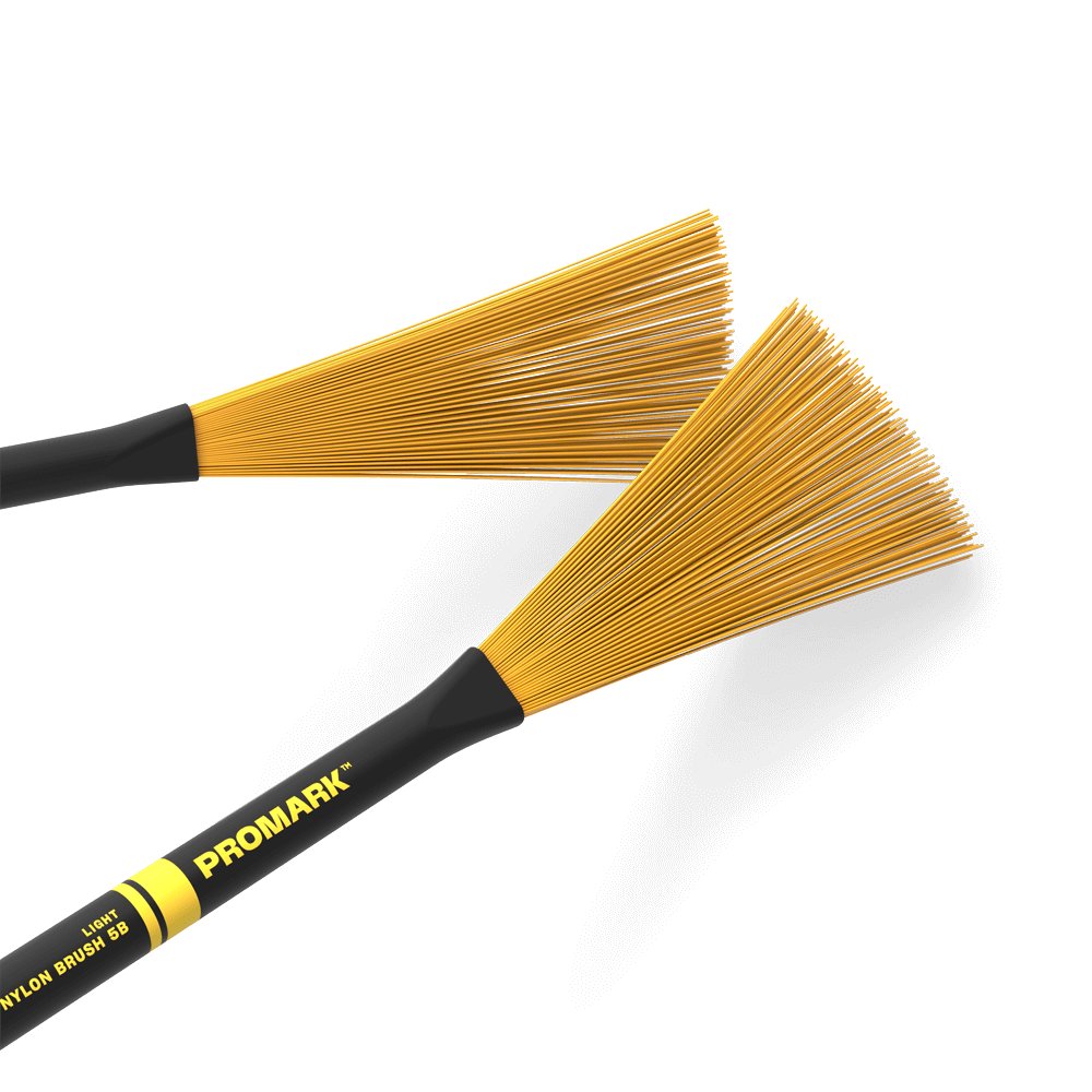 ProMark Heavy Nylon 5B yellow drumstick with nylon tip, used for percussion and drum set playing.