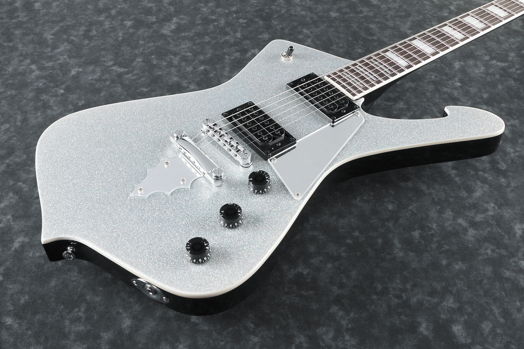 Ibanez PS60 Paul Stanley Signature electric guitar in silver sparkle finish, showcasing its body and hardware details.