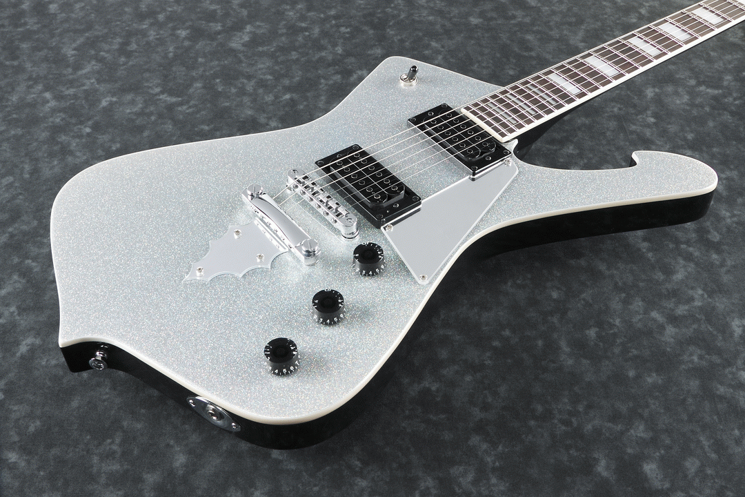 Ibanez PS60 Paul Stanley Signature electric guitar in silver sparkle finish, showcasing its body and hardware details.