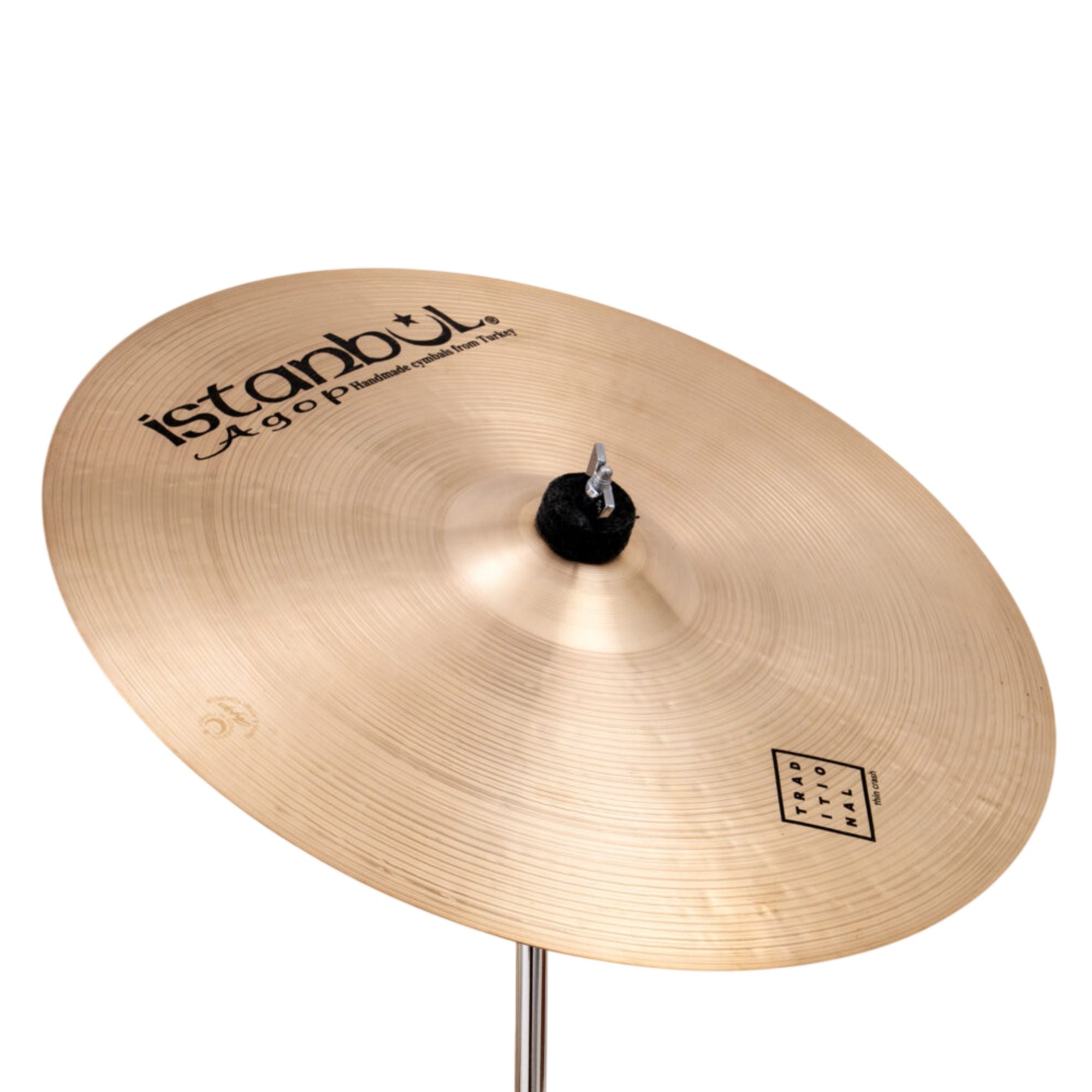 Istanbul 16-inch Agop Traditional Paper Thin Crash cymbal, single cymbal with a shiny bronze finish and intricate branding marks.