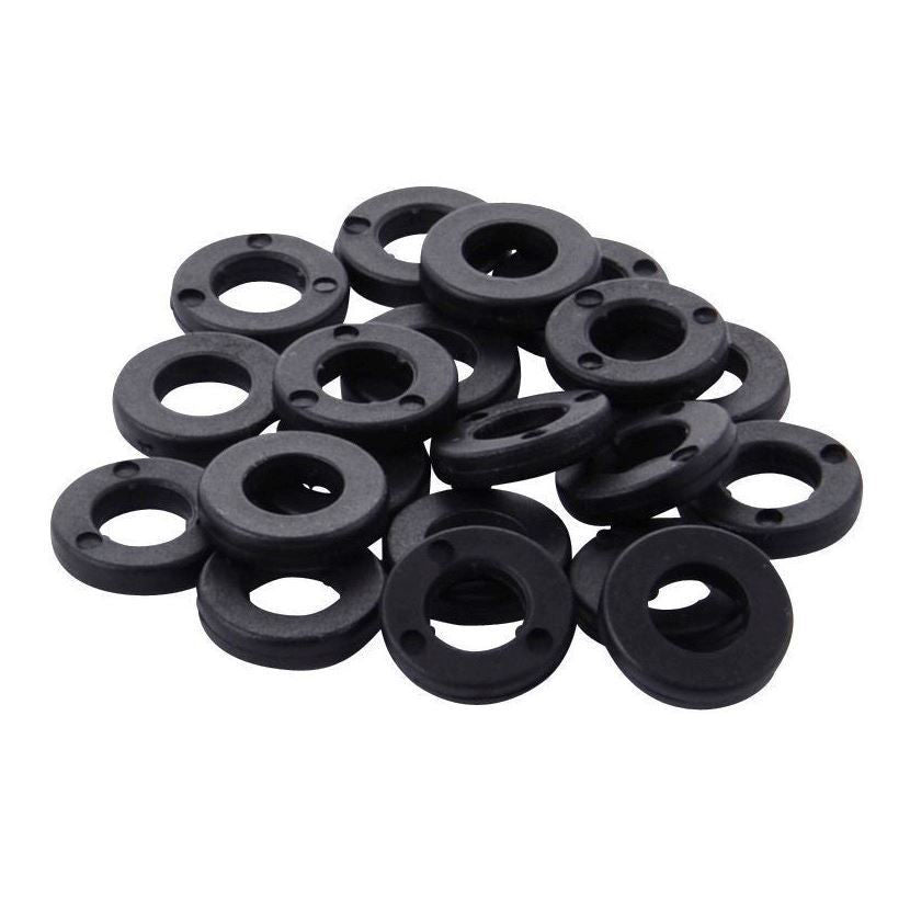 Tama PW620 tension washers made of nylon for drum hardware, shown attached to drum tension rods in a close-up image.