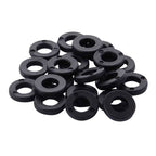 Tama PW620 tension washers made of nylon for drum hardware, shown attached to drum tension rods in a close-up image.