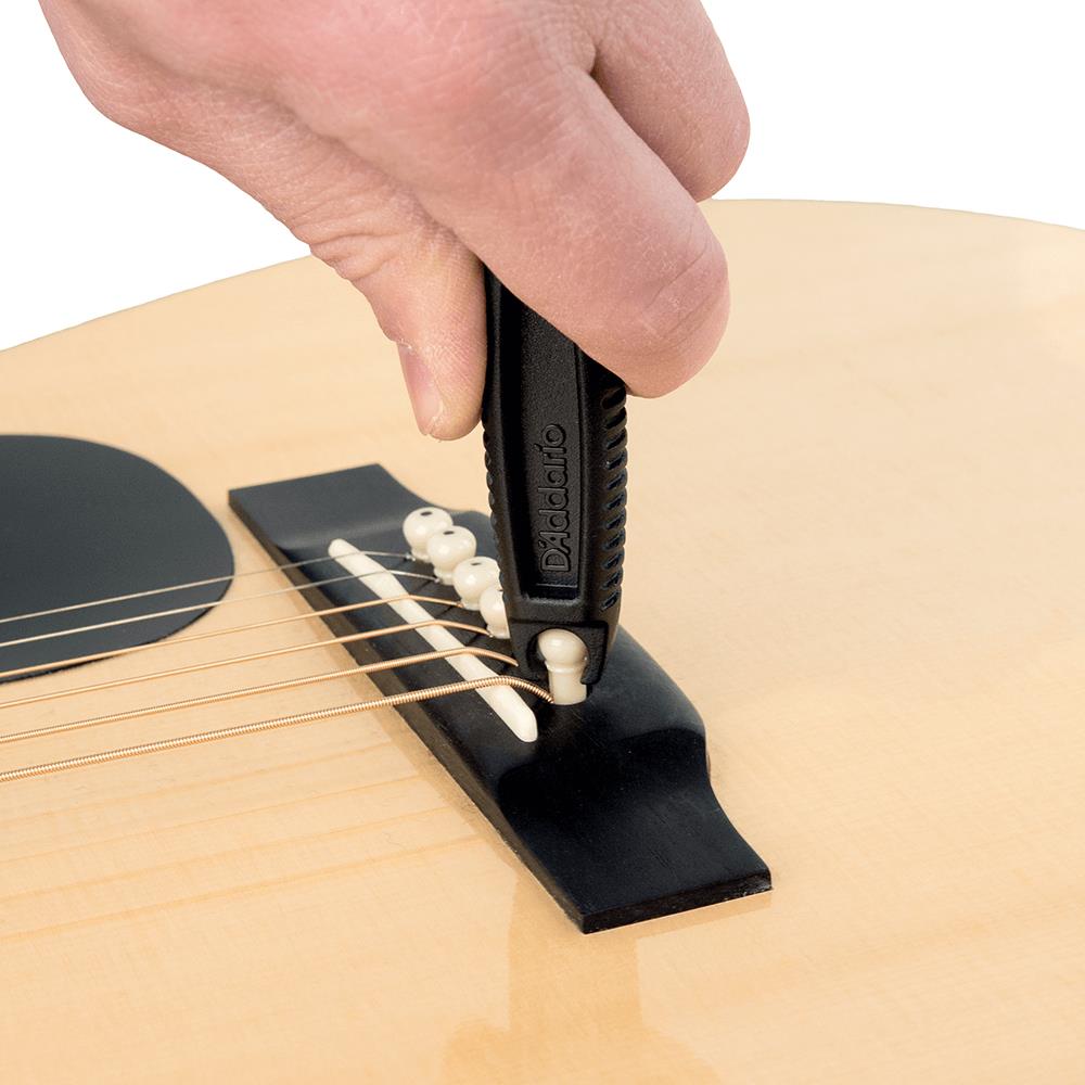 D'Addario Planet Waves guitar peg winder tool for guitar string tuning and bridge pin removal, compact and easy to use.