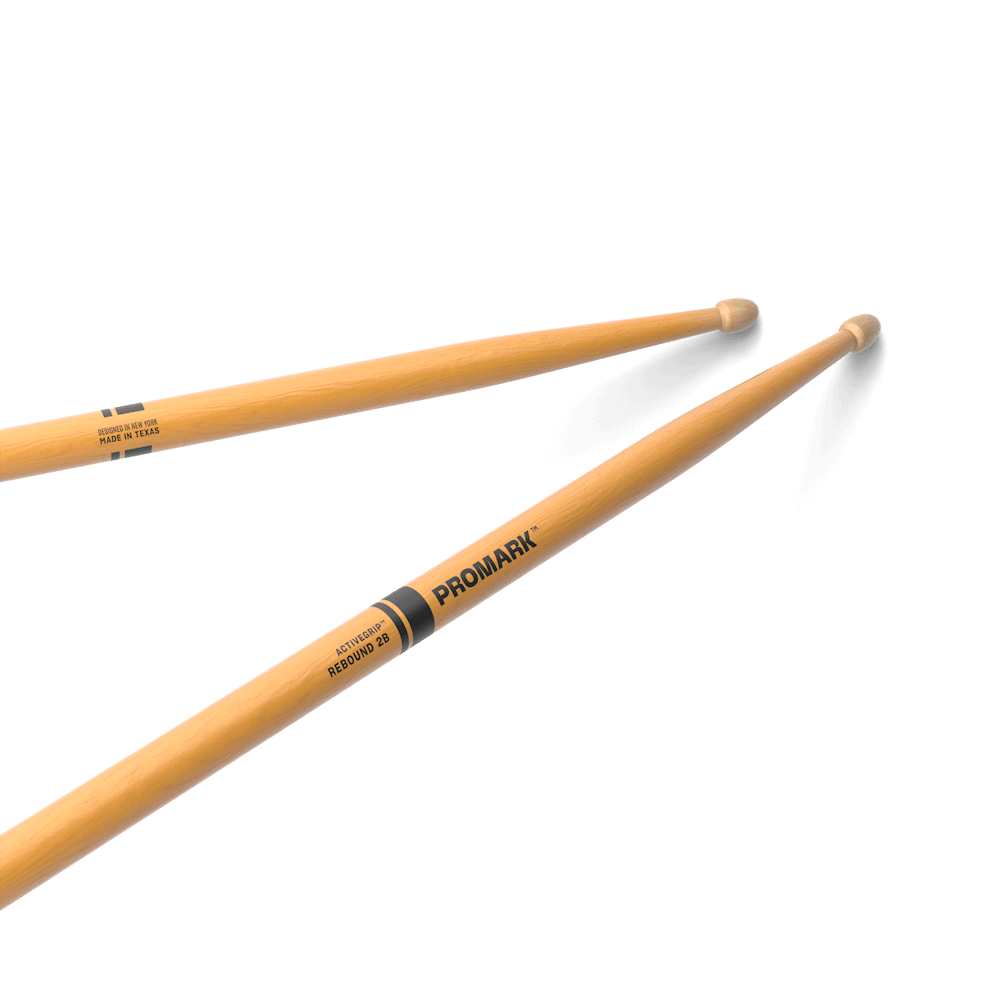 ProMark Rebound 2B ActiveGrip drumsticks with hickory handle and acorn tip, designed for precise drumming and durability.