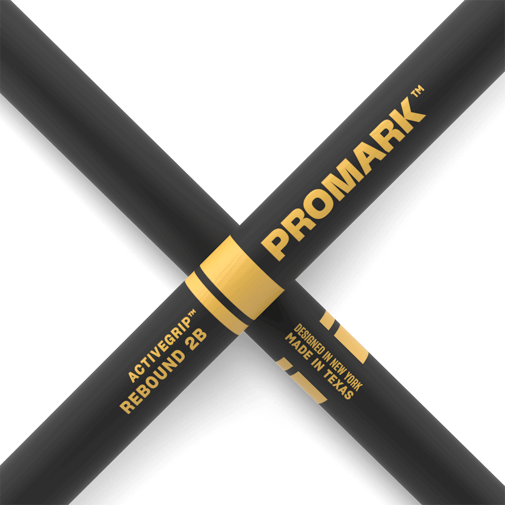 ProMark Rebound 2B ActiveGrip drumsticks with hickory wood and acorn tips, black finish, designed for drummers.