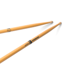Promark Rebound 5B ActiveGrip drumsticks with hickory shaft and acorn tip, designed for drummers, shown with clear finish.