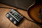 BOSS RE202 Space Echo guitar effects pedal with controls and input/output jacks, used for echo and delay effects.
