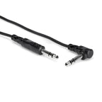 Hosa 1/4 inch TRS to 1/4 inch TRS audio cable, 5-foot length, used for professional PA system connections and audio equipment.