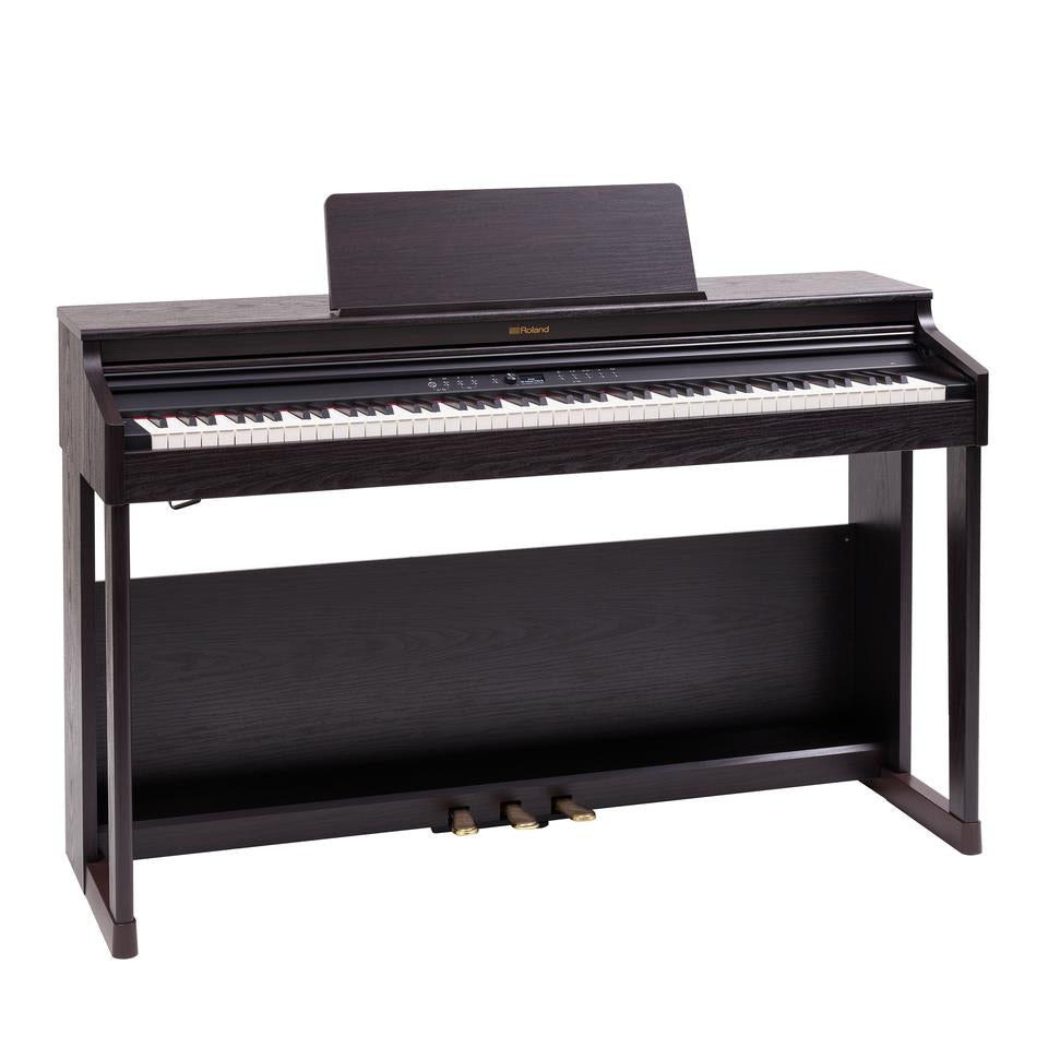Roland RP-701 digital piano in dark rosewood finish, showcasing its sleek design and keyboard keys.