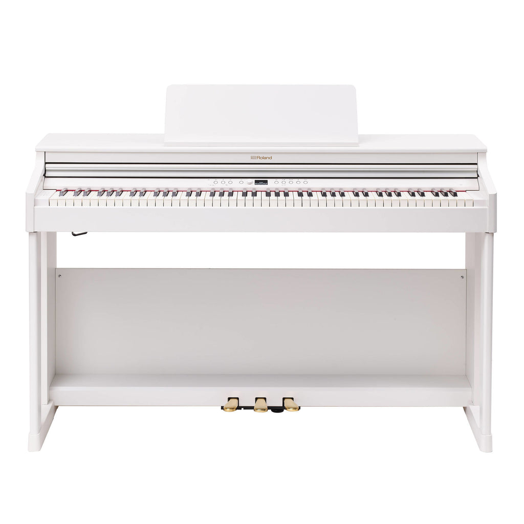 White Roland RP-701 digital piano with sleek design and 88 keys, showcasing its modern home electronic keyboard.