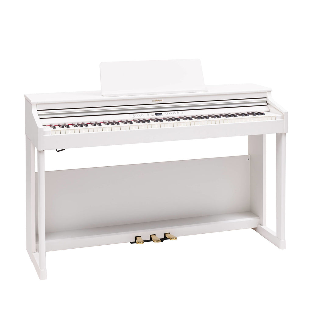 Roland RP-701 White digital piano, home use model with sleek design and full keyboard, close-up of keys and control panel.