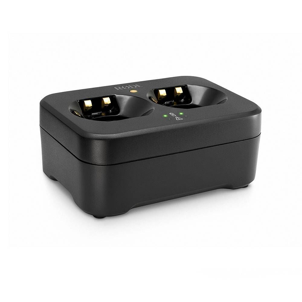 Rode RS-1 dual recharging station for LB1 batteries and TX-M2 wireless microphone transmitters, shown with connected devices.
