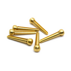 Hosco Japan brass acoustic guitar bridge pin set showing four brass pins with detailed grooves and a glossy finish.