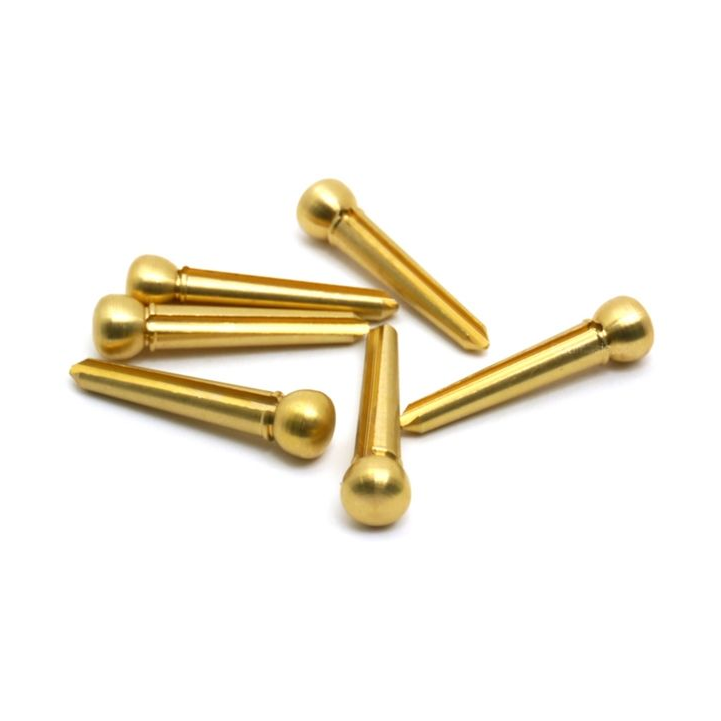 Hosco Japan brass acoustic guitar bridge pin set with six pins, used for securing strings on a guitar bridge.