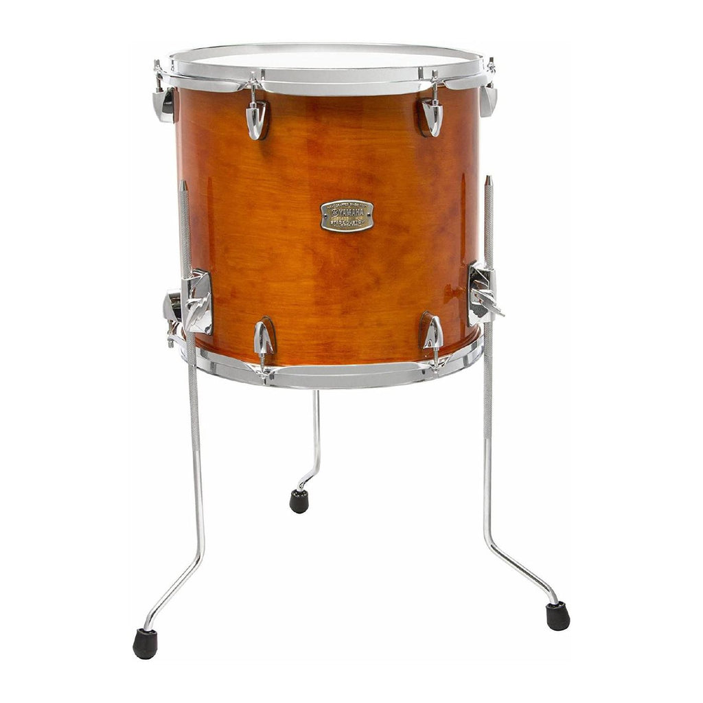 Yamaha Stage Custom Birch 18-inch x 16-inch honey amber floor tom drum with wooden shell and chrome hardware.