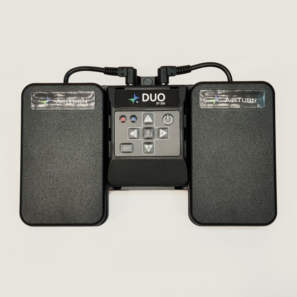 Preloved AirTurn Duo 2 Bluetooth MIDI pedal controller with two foot pedals for hands-free page turning and music control.