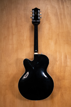 Gretsch Electromatic G5120 electric guitar with double-cutaway body, sunburst finish, and chrome hardware.
