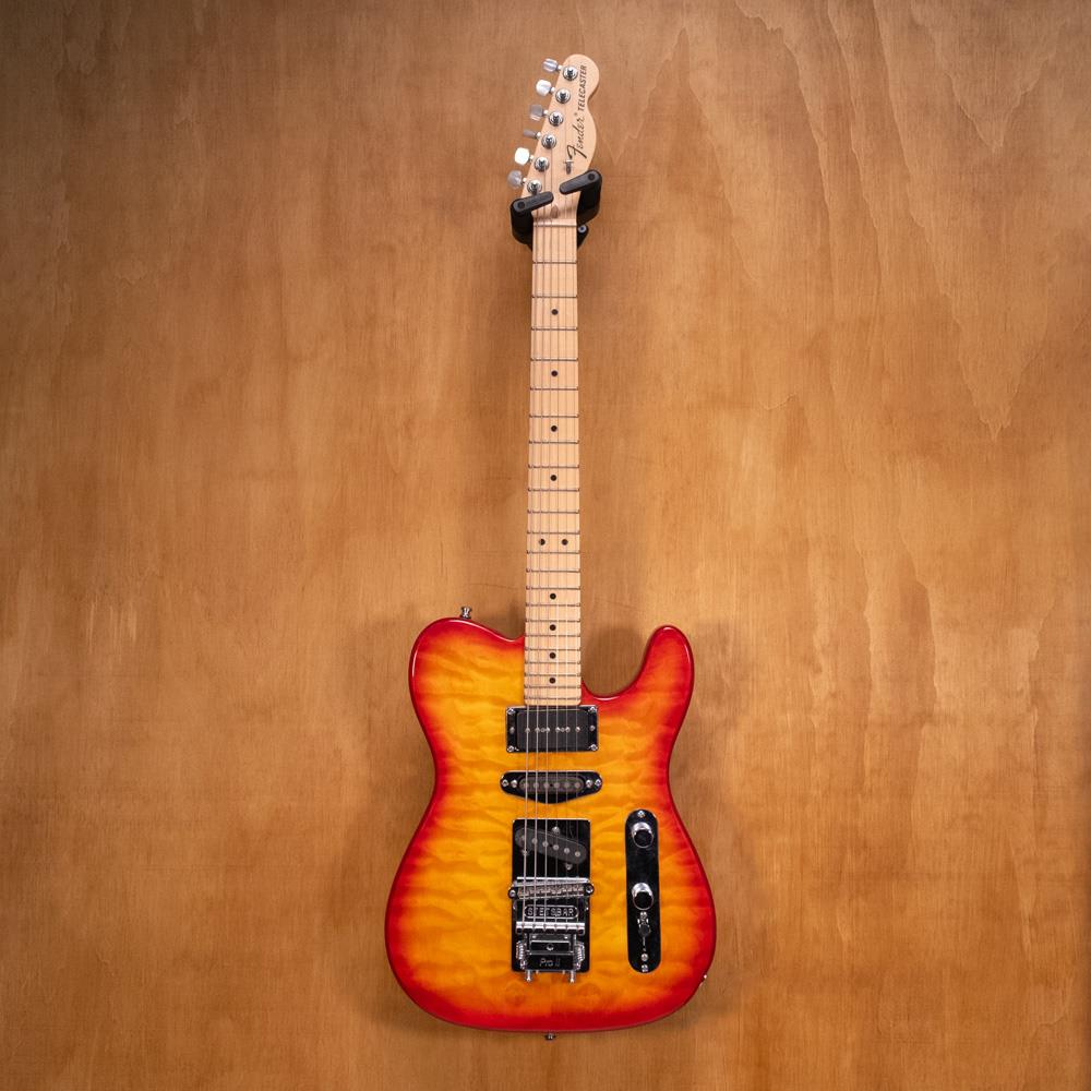 Preloved Fender Telecaster electric guitar featuring a USA neck, showcasing its classic design and hardware details.