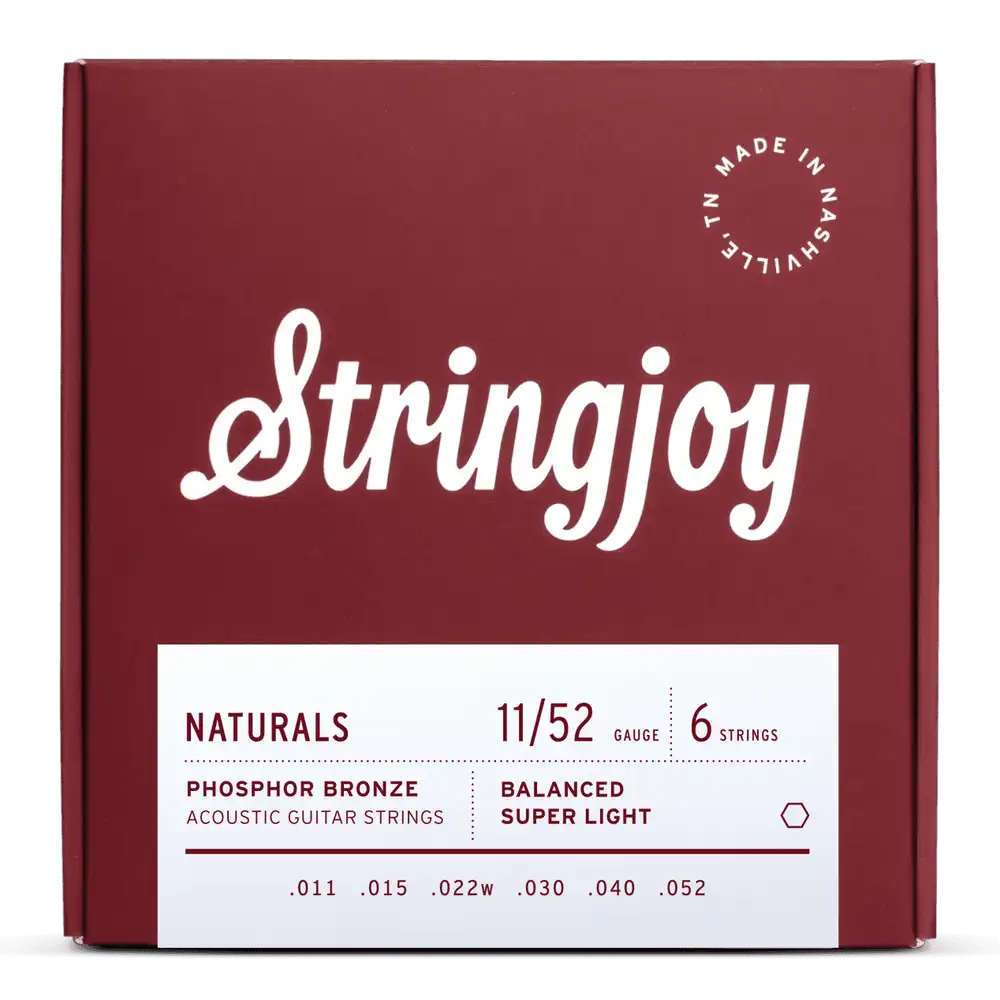 Stringjoy Naturals Super Light Gauge 11-52 phosphor bronze acoustic guitar strings on a guitar.