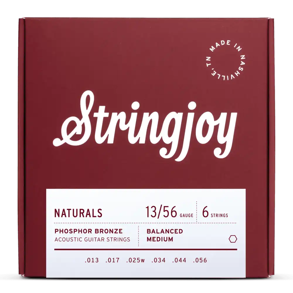 Stringjoy Naturals medium gauge phosphor bronze acoustic guitar strings (13-56) displayed on a guitar.
