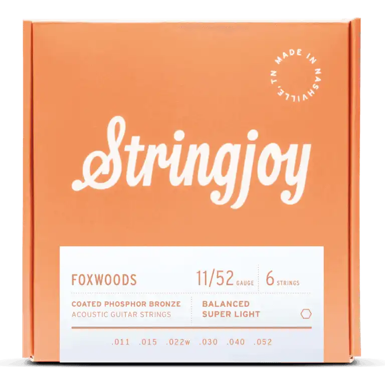 Stringjoy Foxwoods super light gauge coated phosphor bronze acoustic guitar strings, 11-52, with clear packaging and branding.