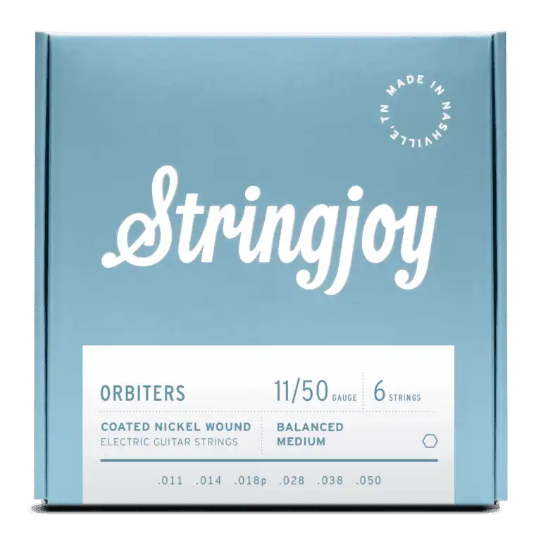 Stringjoy Orbiters balanced medium gauge 11-50 coated nickel wound electric guitar strings laid out on a white background