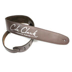 Cole Clark leather saddle brown guitar strap, adjustable and padded, with detailed stitching for comfortable playing.