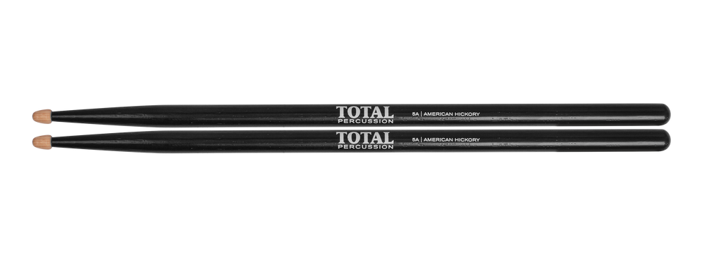 Total Percussion 5A drumsticks in black with wood tips, showing the sleek sticks suited for versatile drumming.