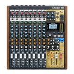 TASCAM Model 12 digital multitrack recorder with integrated USB audio interface and analog controls, shown with input connections.