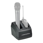 Audio-Technica ATWCHG2 two-bay recharging station for wireless microphones, shown with connected microphones and charging ports.