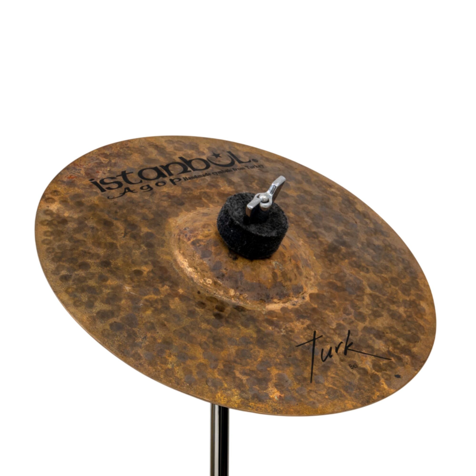 Istanbul 7 Istanbul Agop Turk Bell single cymbal with a vintage finish and intricate design, mounted on a stand.