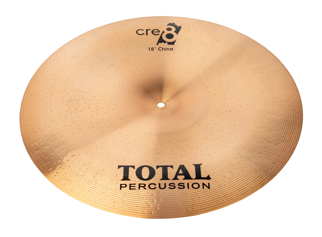 Total Percussion 18-inch China cymbal showing a shiny, bronze finish with a slightly curved edge and intricate hammering details.
