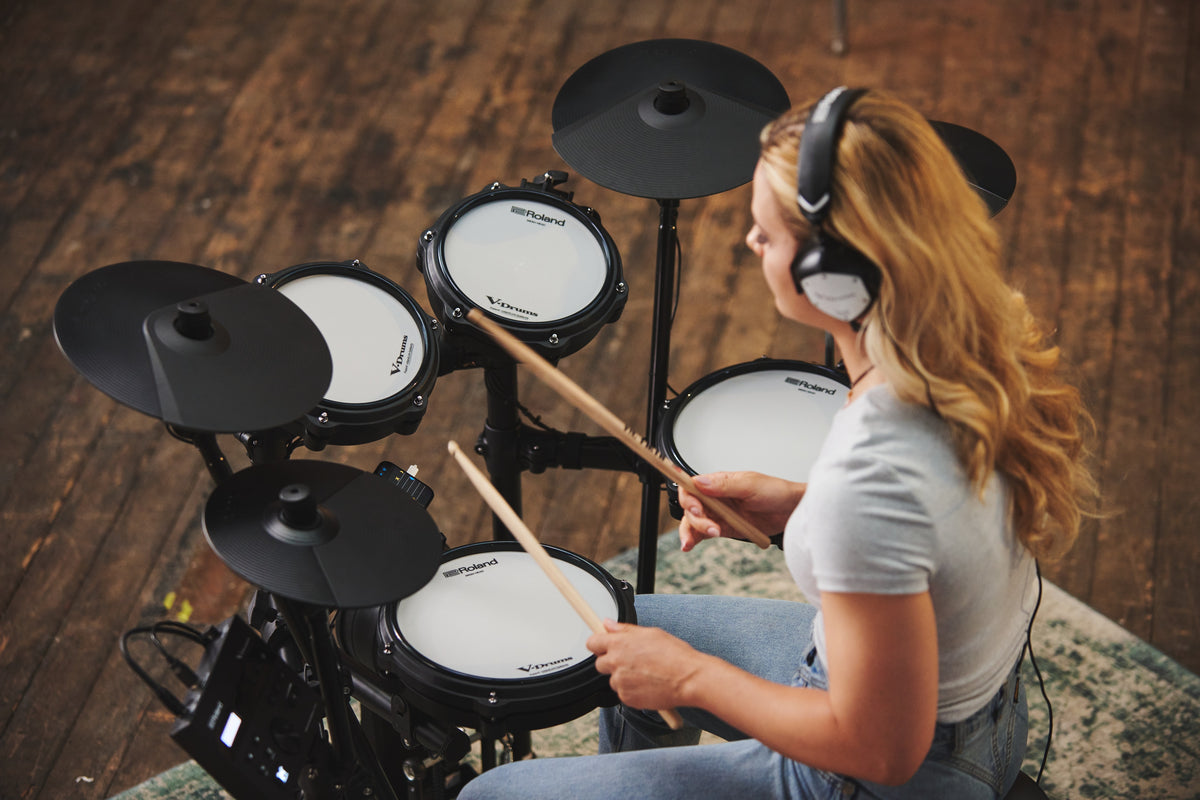 Roland TD-07DMK2 V-Drums electronic drum kit with mesh drum pads and cymbals, compact and professional-grade for drummers.