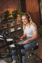 Roland TD-07DMK2 V-Drums electronic drum kit with mesh snare, cymbals, and drum pads set up for practice and performance.