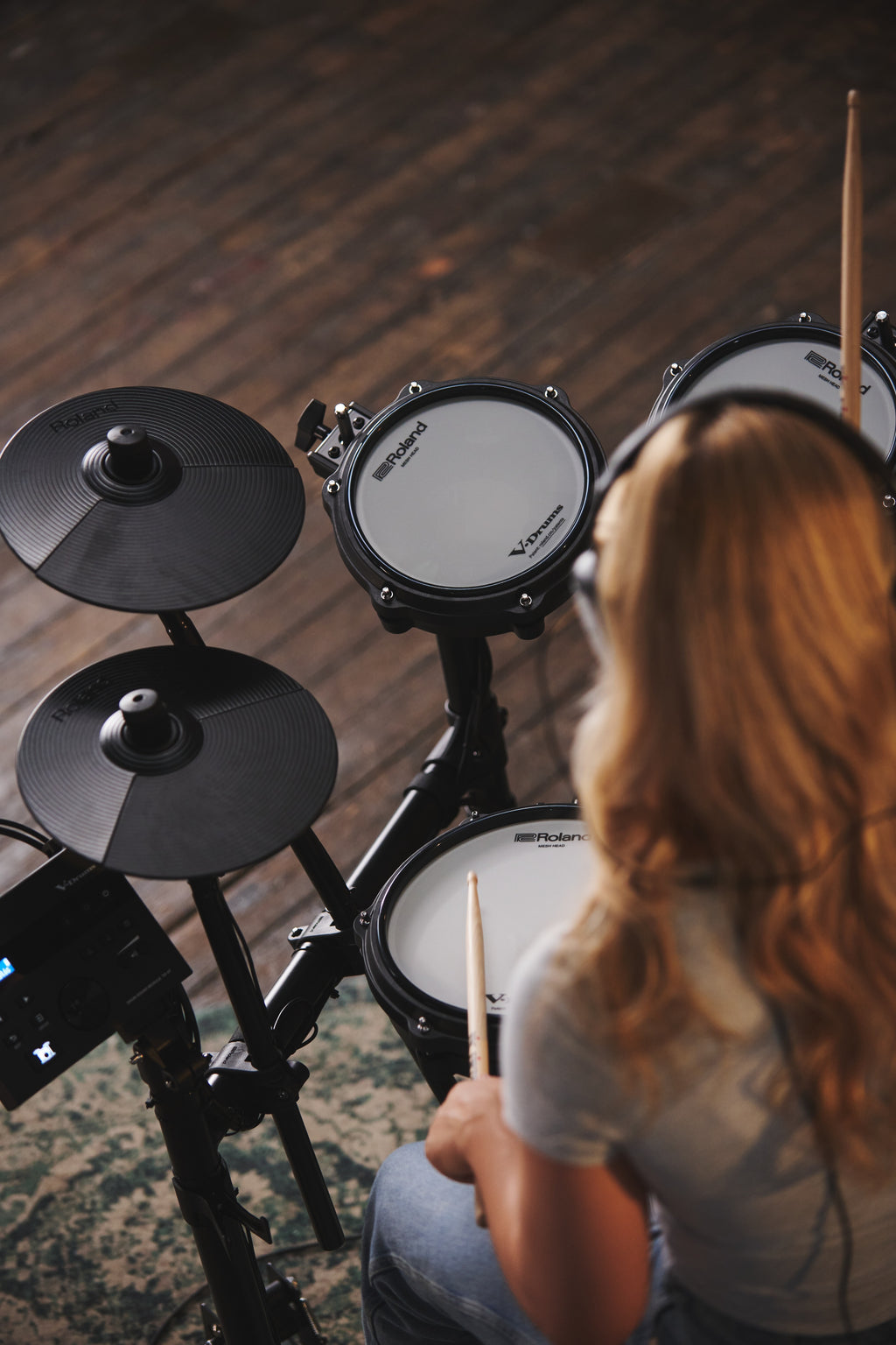 Roland TD-07DMK2 V-Drums electronic drum kit with mesh drum pads and cymbals, compact and versatile for beginner to intermediate players.