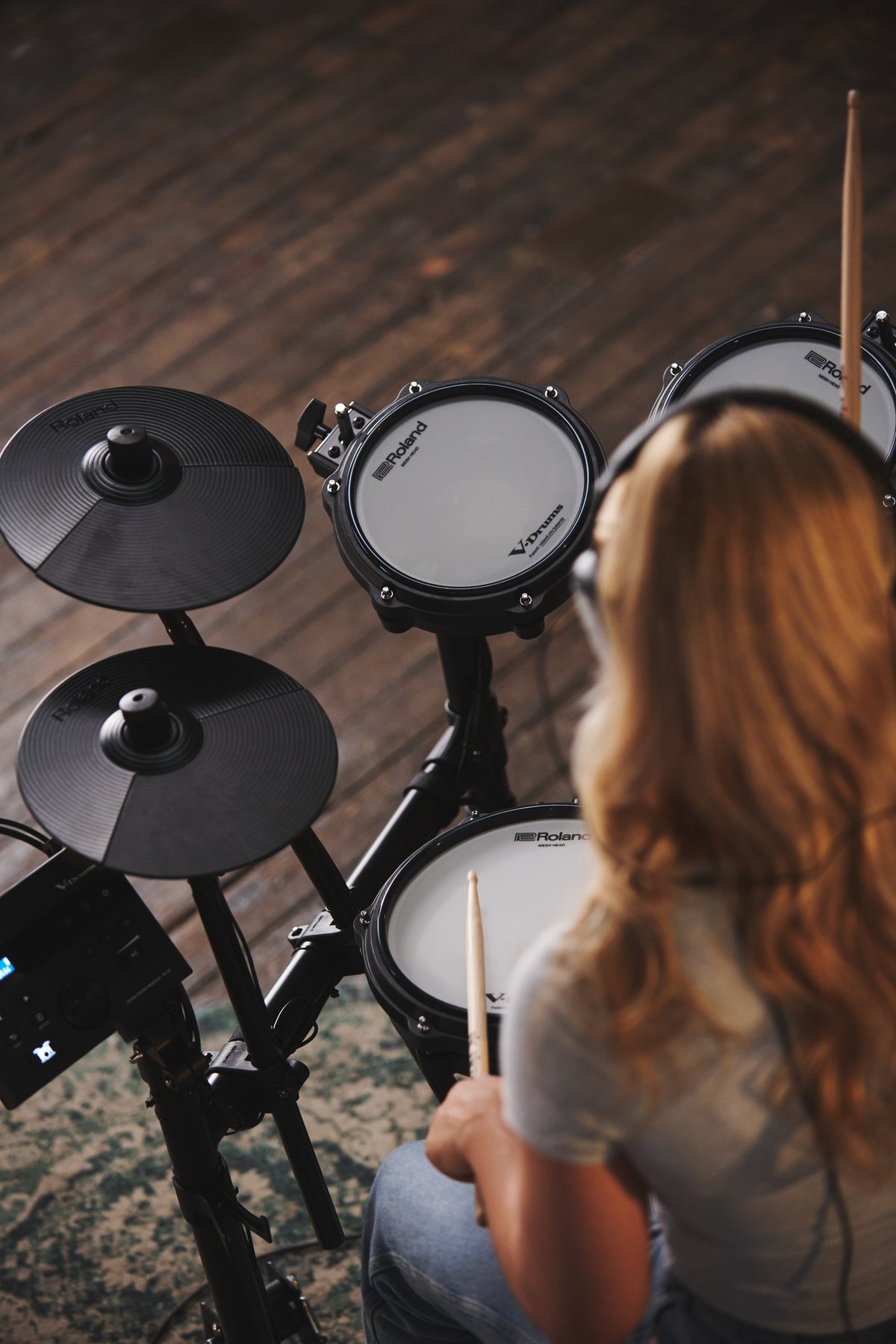 Roland TD-07DMK2 V-Drums electronic drum kit with mesh drum pads and cymbals, compact and versatile for beginner to intermediate players.