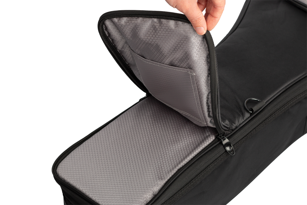 Xtreme Xtreme Pro Premium Deluxe 4/4 Classic Folk Guitar Bag showing top pocket and durable fabric for guitar accessories.