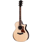 Taylor 814ce Next-Gen acoustic guitar in natural finish, showing the body, soundhole, and fretboard with intricate inlays.