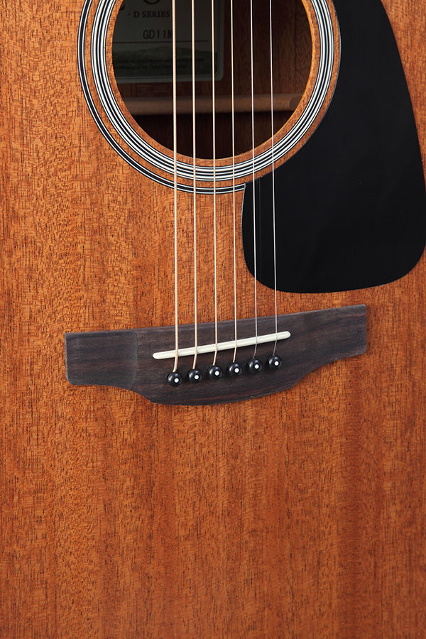 Takamine G11 Series cutaway dreadnought acoustic guitar with pickup, mahogany body, and natural finish.