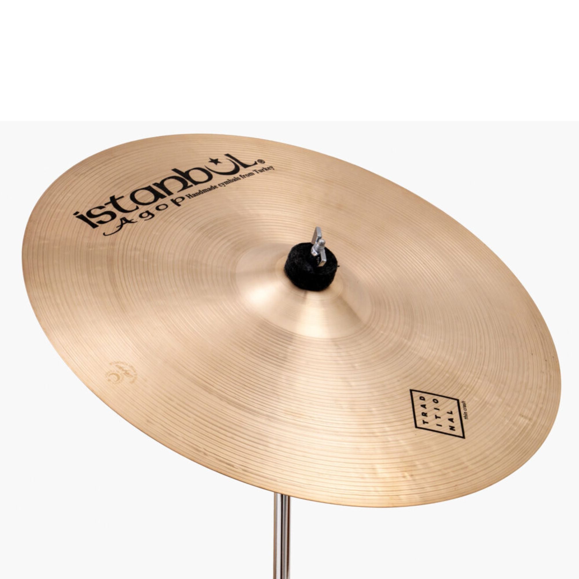 Istanbul Agop Traditional Thin Crash cymbal, single cymbal, with a shiny finish and detailed branding visible on the surface.