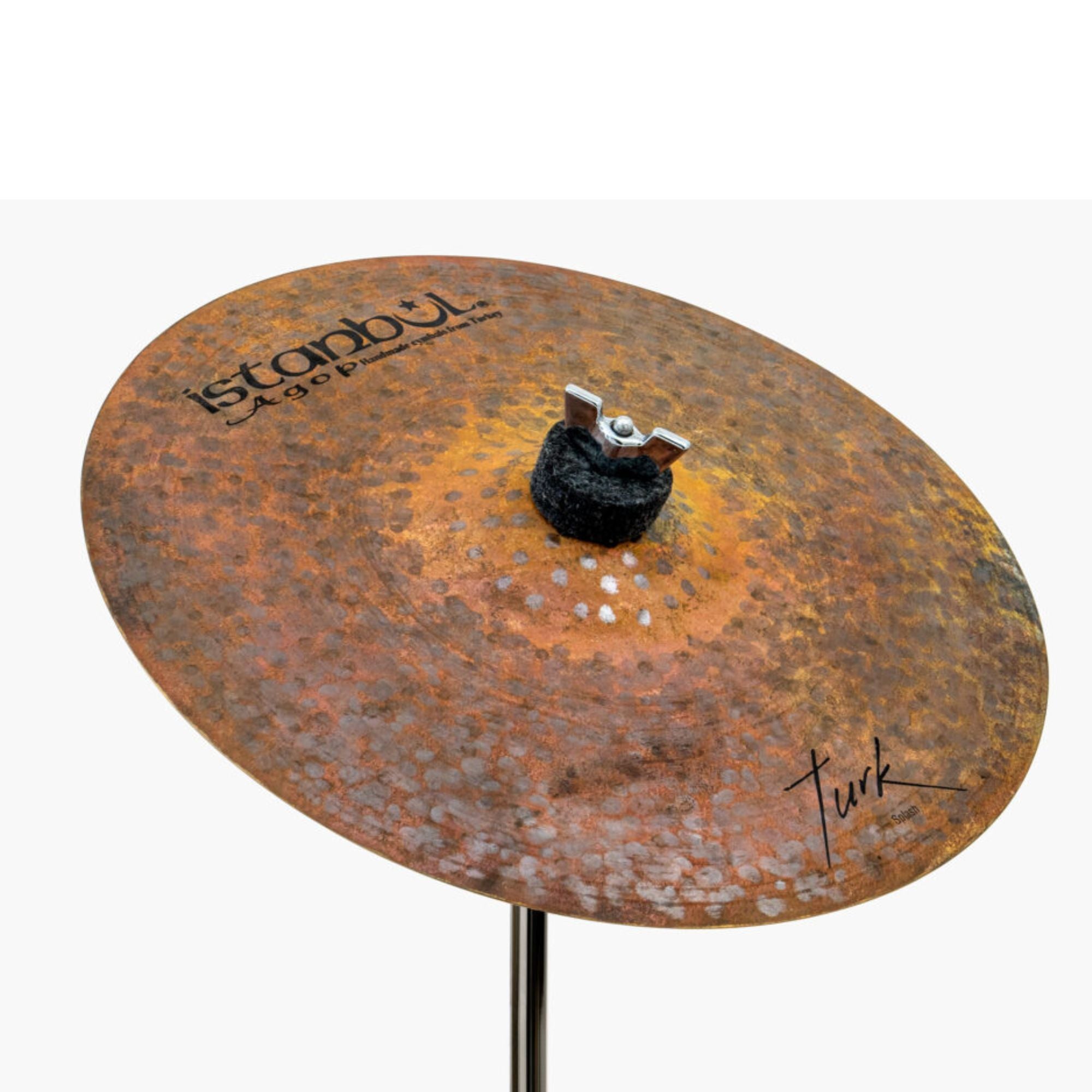 Istanbul Agop Turk Splash single cymbal, metal with a shiny finish and small splash design, mounted on a stand.
