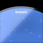 Evans hydraulic blue 13-inch drum head with dual-layer construction, designed for rich sound and durability in drum sets.