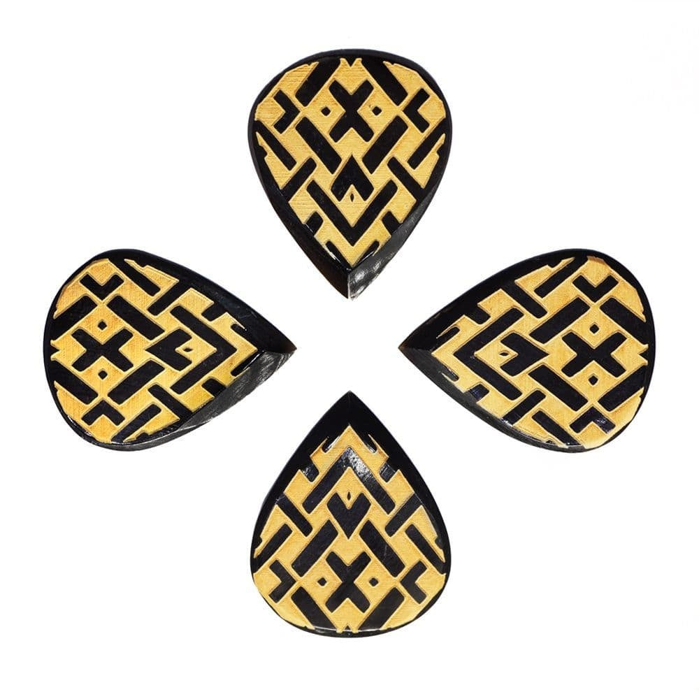 Set of four Celtic tribal design Timber Tones guitar picks with intricate patterns, ideal for acoustic and electric guitar playing.