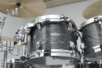 Tama Star Walnut 22-inch 4-piece drum kit shell pack with satin charcoal finish, featuring 10, 12, 16-inch shells and Japanese Sen accents.