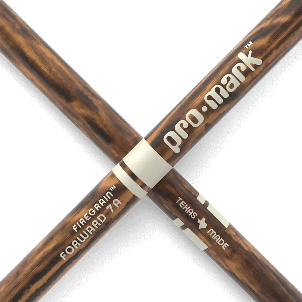 ProMark Classic 7A FireGrain drumsticks with wood tips, featuring a natural finish, designed for drummers.