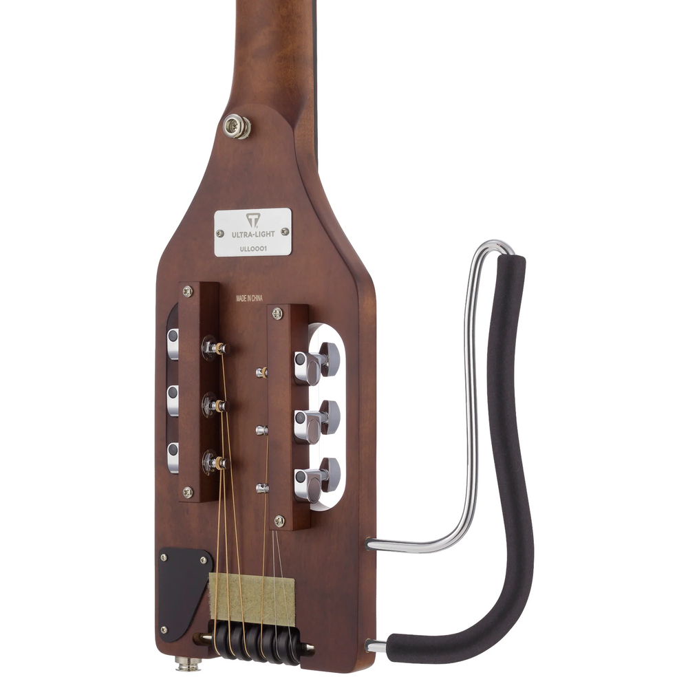 Left-handed Traveler Guitar Ultra-Light acoustic guitar in antique brown, showing the compact body and smooth wood finish.