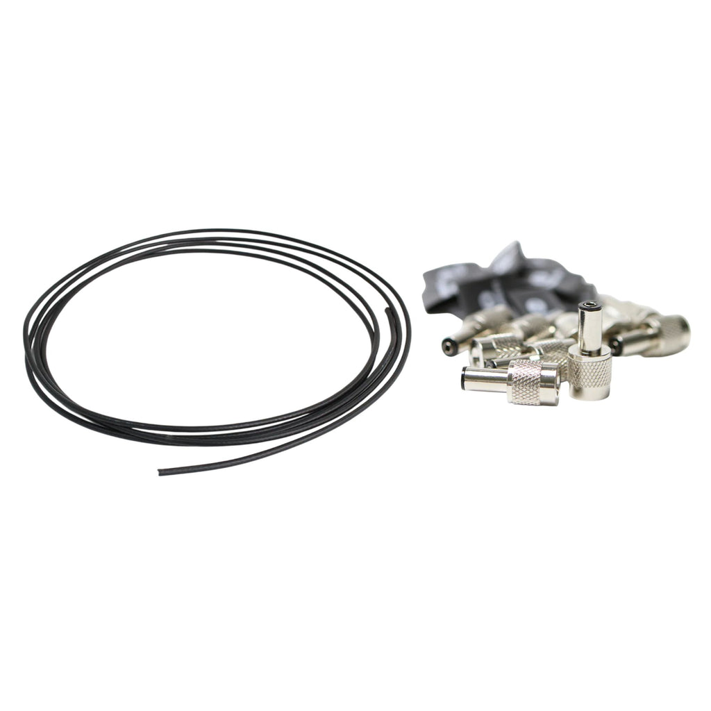 Black 3 Monkeys DC Pedal Kit with 10 guitar plugs and 10ft cable, designed for connecting effects pedals and audio gear.