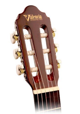 Valencia VC104 4/4 size classical guitar with natural finish, showcasing the wood grain and traditional nylon strings.